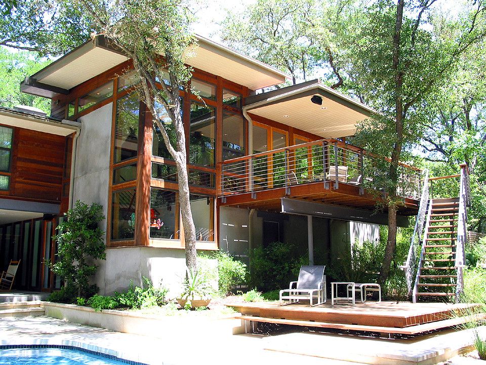 Monolithic Slab for a Contemporary Exterior with a Stairs to Roof Deck and Taylor Slough Creek House Back Elevation by Tom Hurt Architecture