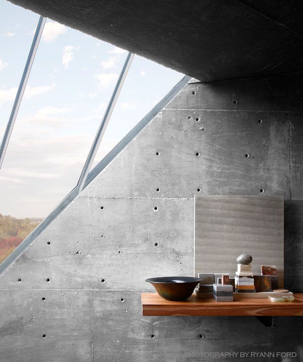 Monolithic Slab for a Industrial Home Office with a Concrete Texture and Concrete Studio by Mell Lawrence Architects