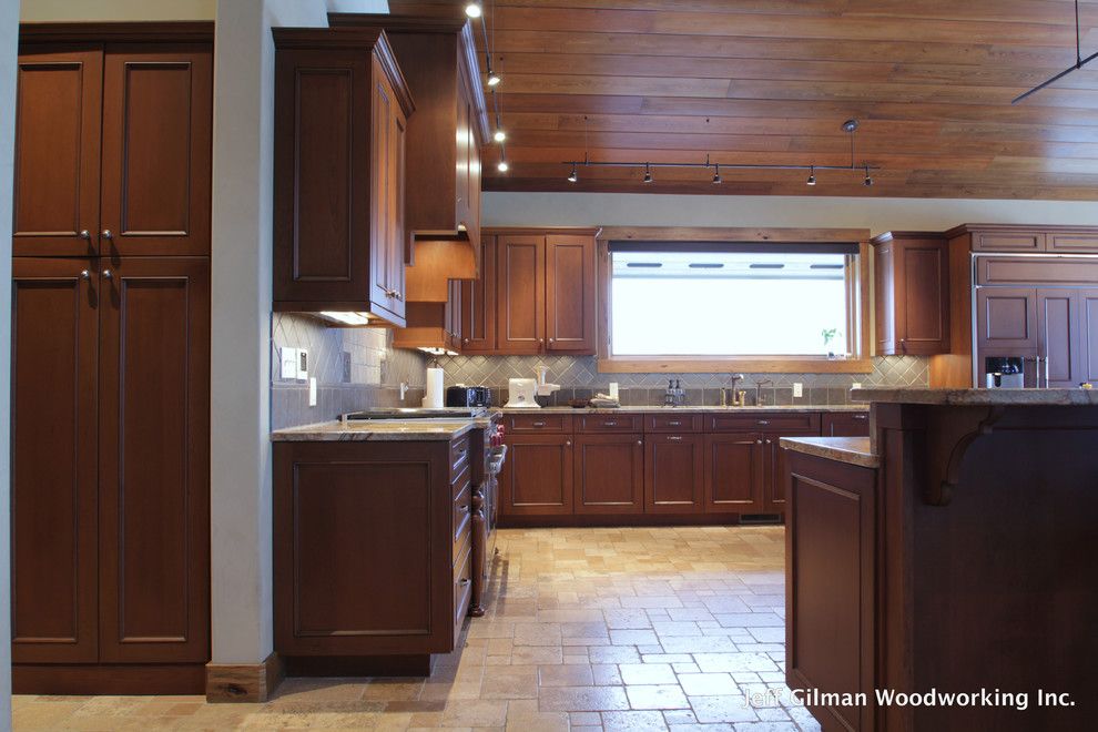 Montana Mountains for a Traditional Kitchen with a Whitefish Mountain Resort and a Mountain Top Estate by Jeff Gilman Woodworking Inc.