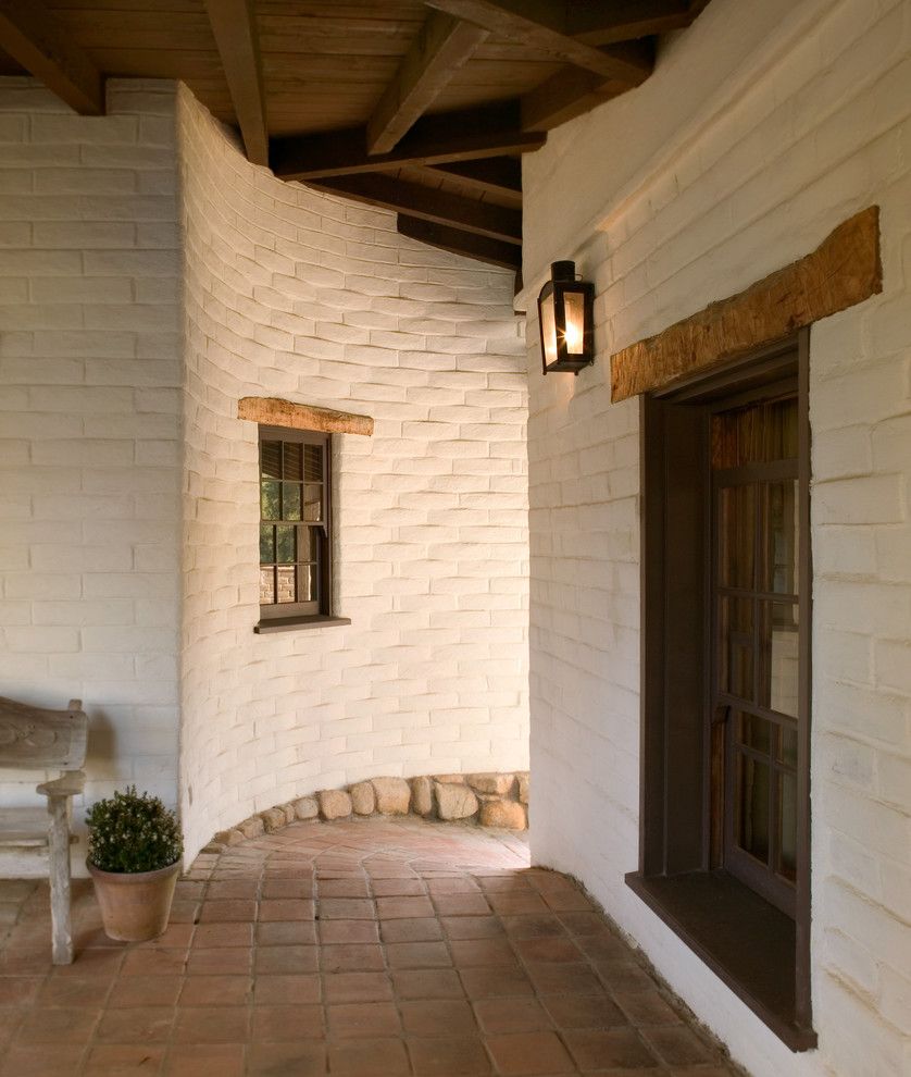 Montecito California for a Southwestern Exterior with a Wood Lintels and Exterior Hallway by Tom Meaney Architect, Aia