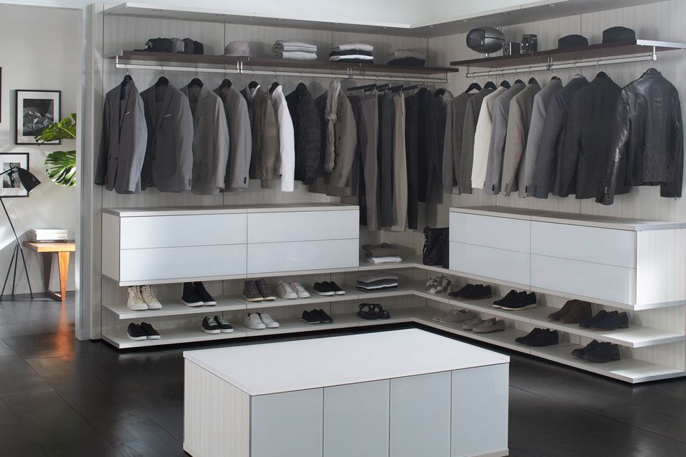 Morningstar Storage for a Contemporary Bedroom with a Dark Wood Flooring and Milano Grey Reach  in Closet by California Closets Hq