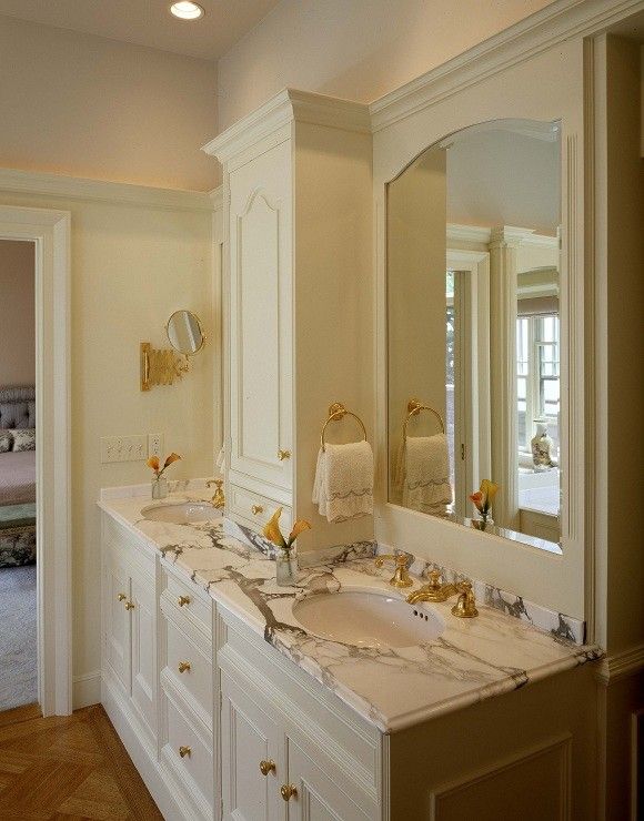 Morningstar Storage for a Traditional Bathroom with a Custom Marble Vanity and Calacatta Marble Vanity by Morningstar Stone & Tile