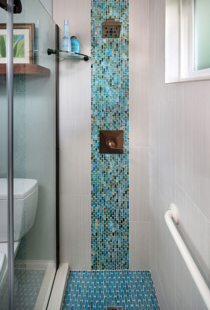 Mosaiq for a Tropical Bathroom with a Shower Shelf and Tropical Condo Bath by Gloria Carlson   Harrell Remodeling, Inc.