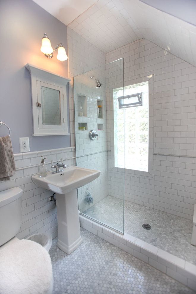 Mosart for a Traditional Bathroom with a White Subway Tile Shower and Minneapolis Victorian Bathroom Remodel by Castle Building & Remodeling