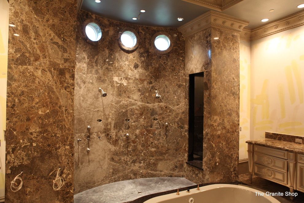 Munire for a Modern Bathroom with a Modern and Modern Slab Bathroom Floor with Design & Slab Shower by the Granite Shop