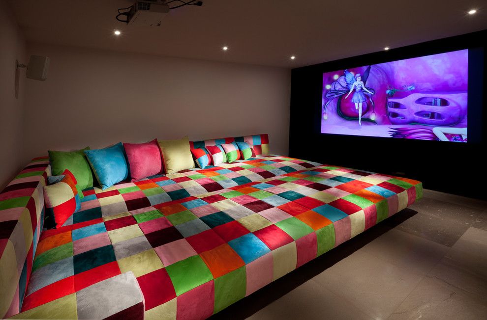 Natick Movie Theater for a Eclectic Home Theater with a Throw Pillows and Media Room by Elad Gonen