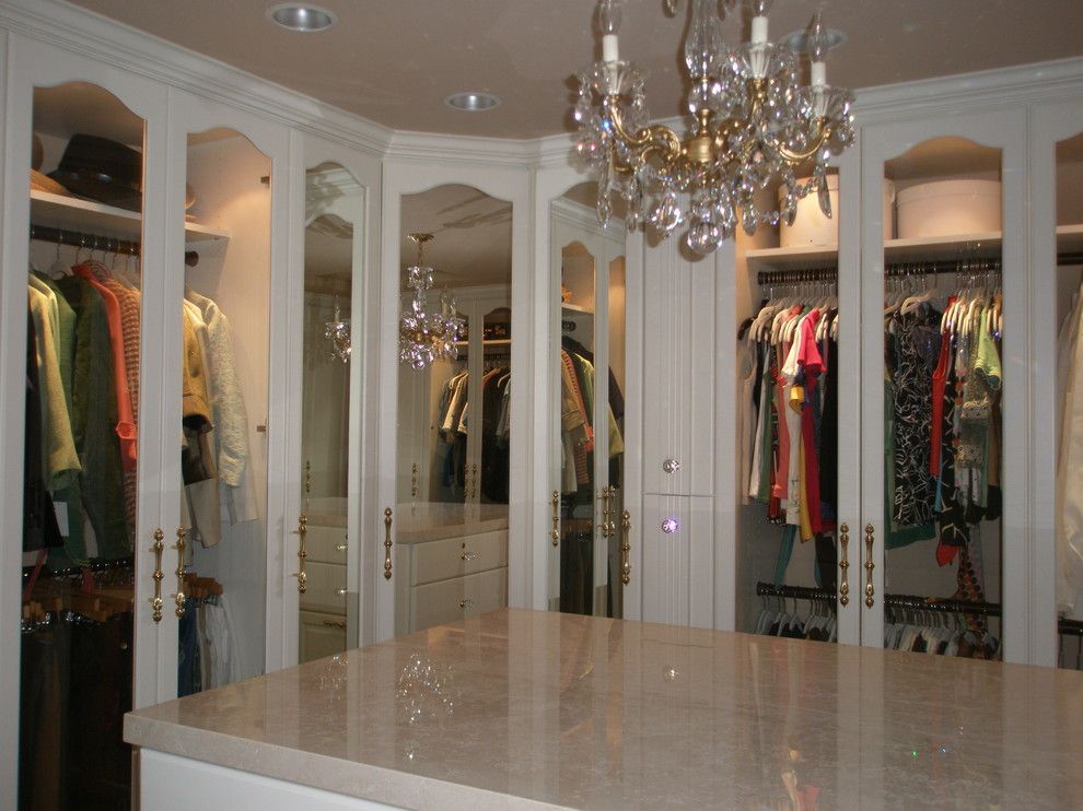 Nora Lighting for a Traditional Closet with a Malka in the Closet and Traditional Closet by Closetinnovations.com