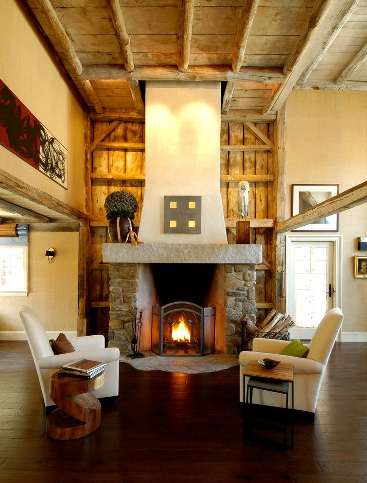 North Country Storage Barns for a Rustic Living Room with a Fireplace Screen and Greek Revival Farmhouse by Charlie Allen Renovations, Inc.