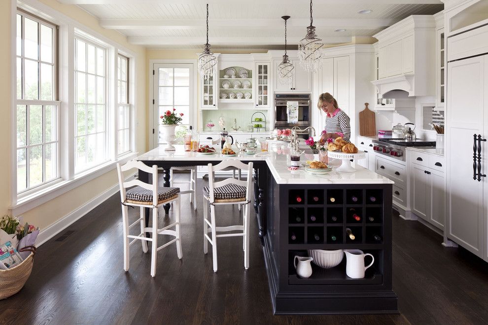 North Country Storage Barns for a Traditional Kitchen with a Black Island and Sunnyside Road Residence Kitchen 3 by Martha O'hara Interiors