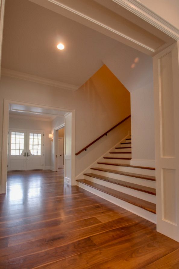 Oaks of Denton for a Transitional Staircase with a Hanging Fireplace and Charlotte, Nc American Black Walnut Flooring by Oak & Broad