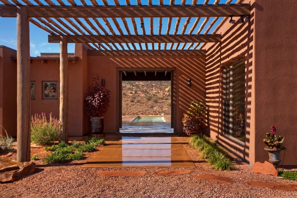 Odyssey House Utah for a Southwestern Entry with a Stucco and Moab Utah Vacation Home by Karen White Interior Design