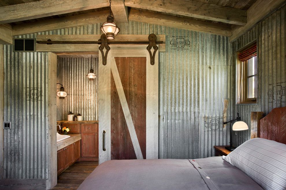 Old Masters Stain for a Farmhouse Bedroom with a Corrugated Metal Walls and Springhill Residence by Locati Architects