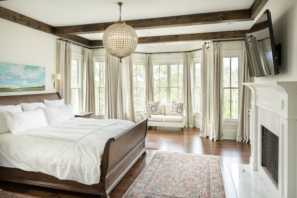 Old Masters Stain for a Traditional Bedroom with a Dark Wood Bed Frame and T Olive Properties by David Cannon Photography