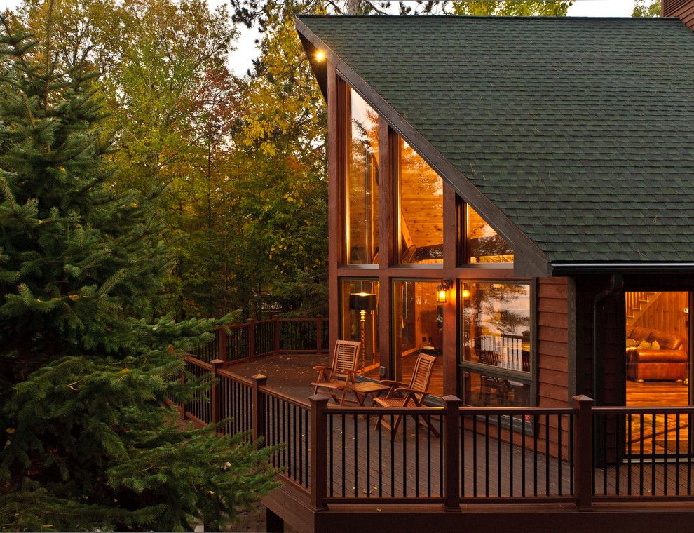 Ole Miss Housing for a Rustic Exterior with a Deck and Cabin Remodel by Bercher Design & Construction