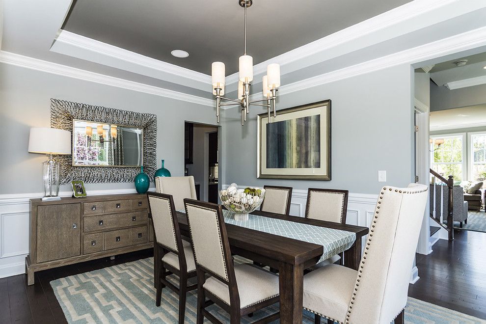Olson Rug for a Traditional Dining Room with a Light Blue Walls and M/i Homes of Raleigh: Overlook at Amberly   Hawthorne Model by M/i Homes