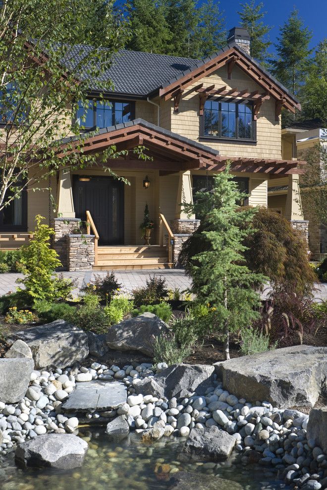 Oregon Decorative Rock for a Craftsman Exterior with a Entrance and Copper Falls by Alan Mascord Design Associates Inc