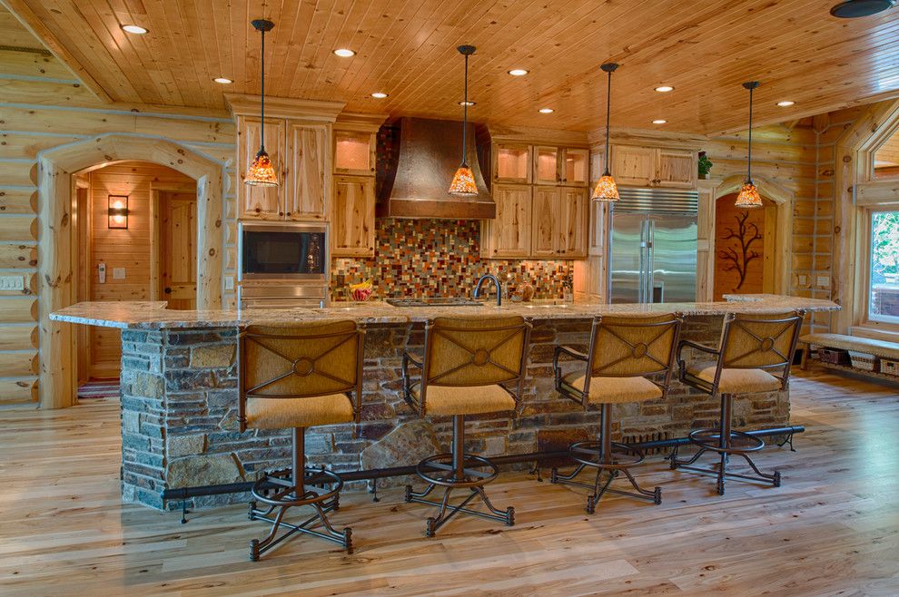 Oregon Decorative Rock for a Rustic Kitchen with a Pendant Lighting and Refined Log Home by Destree Design Architects, Inc.