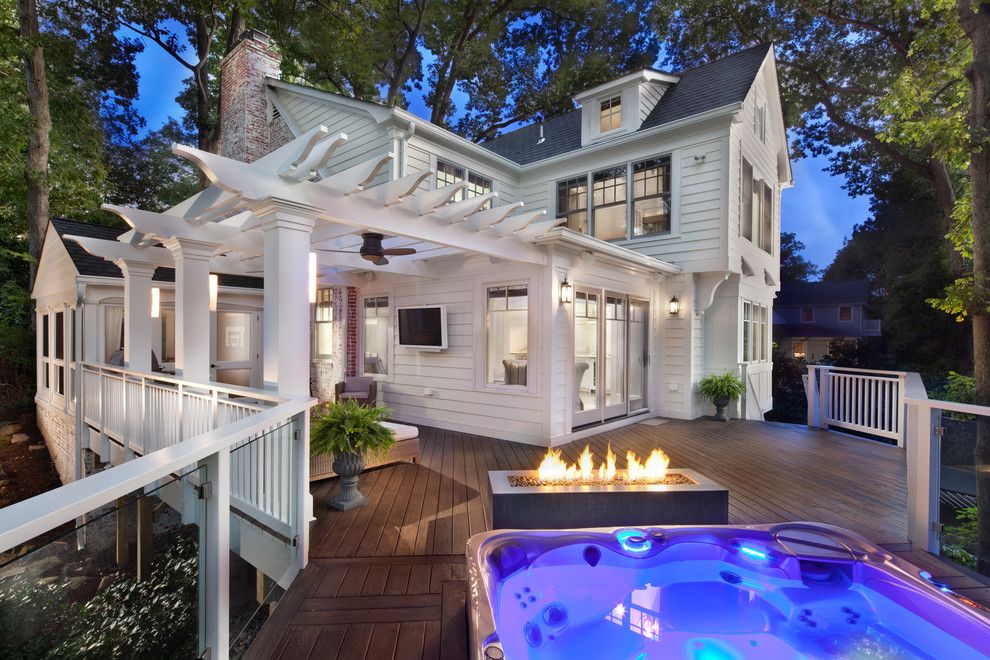 Outdoor Basketball Courts Near Me for a Traditional Deck with a Wall Mounted Tv and Trimmed to Perfection by Anthony Wilder Design/build, Inc.