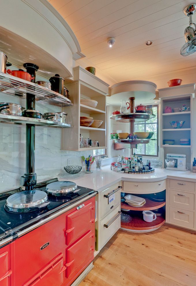 Pacific Energy Wood Stove for a Contemporary Kitchen with a Red Aga and Casa Melanzana by Harris Architects, Pllc