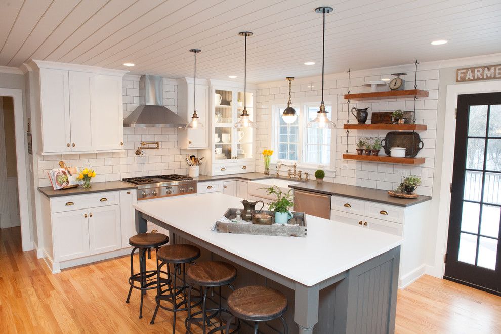 Pacific Energy Wood Stove for a Farmhouse Kitchen with a Pendant Lighting and Modern Kitchen Chicago by Joe Nowak Photography