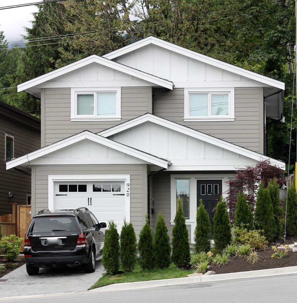 Paint Aluminum Siding for a Traditional Exterior with a Board and Batten Siding and North Vancouver New Home by Mccabe Design & Interiors