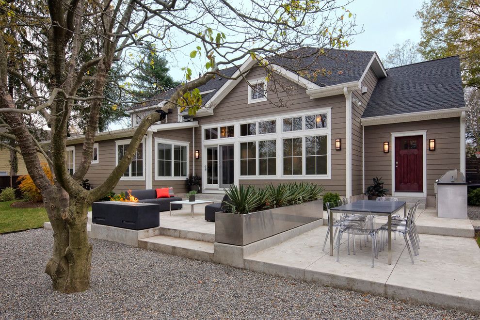 Painting Vinyl Siding for a Contemporary Patio with a Clear Acrylic Chairs Gravel and Stunning Contemporary by Knight Architects Llc