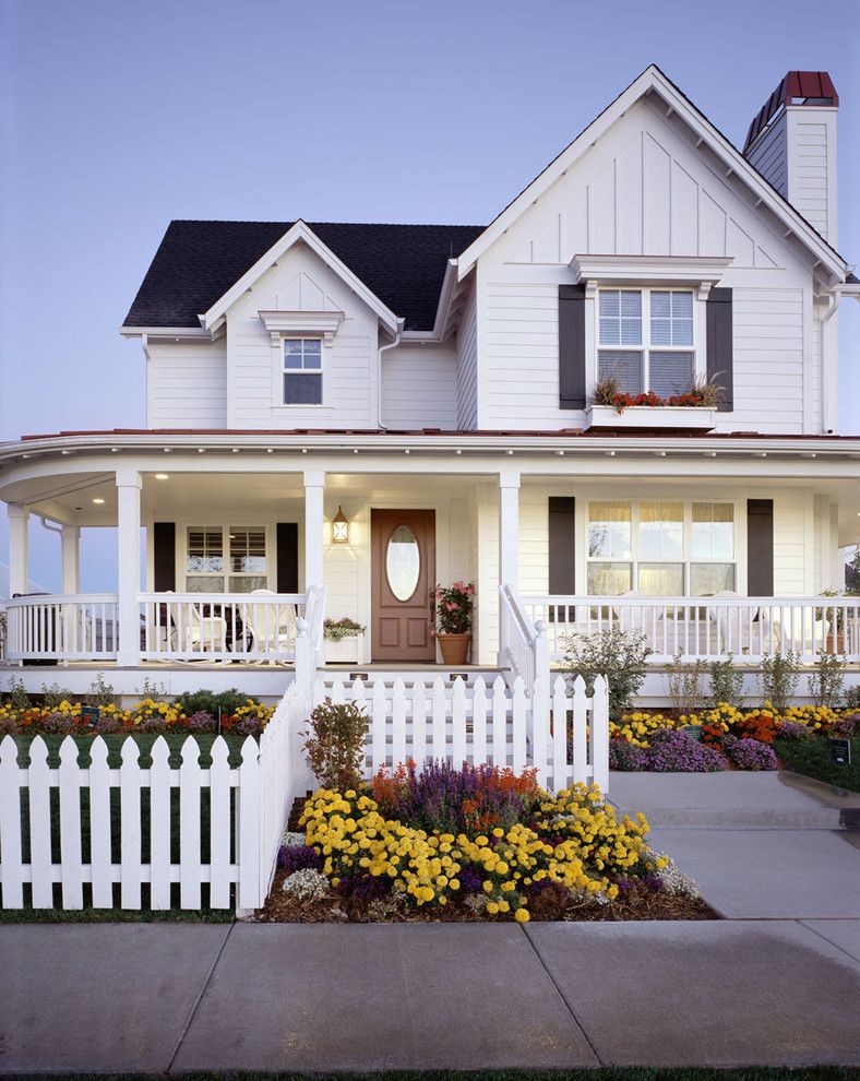 Painting Vinyl Siding for a Traditional Exterior with a Black Shutters and Parade of Homes by Trustile Doors