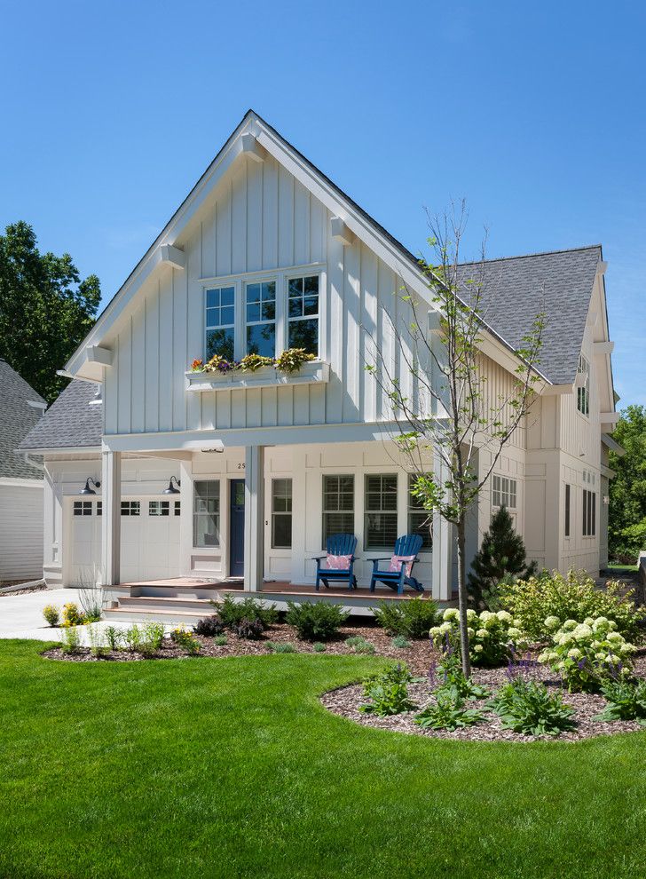 Painting Vinyl Siding for a Traditional Exterior with a Lawn and Kenwood Cottage by Peterssen/keller Architecture