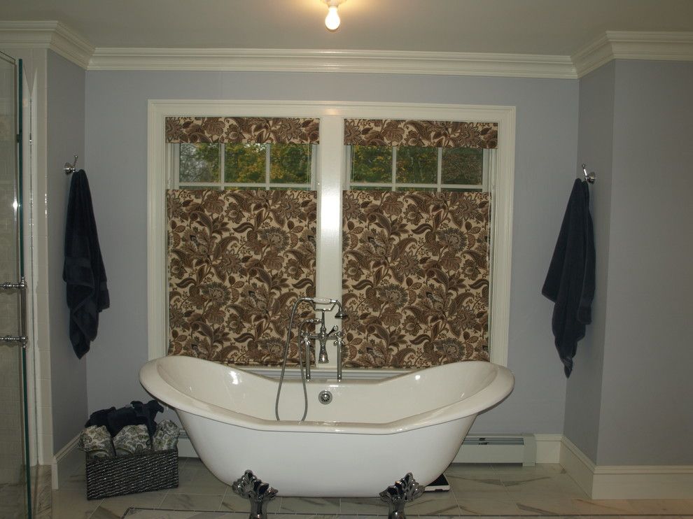 Paramus Lighting for a Traditional Bathroom with a Privacy Roman Shade and Masterbath by Budget Blinds of Paramus & Westwood