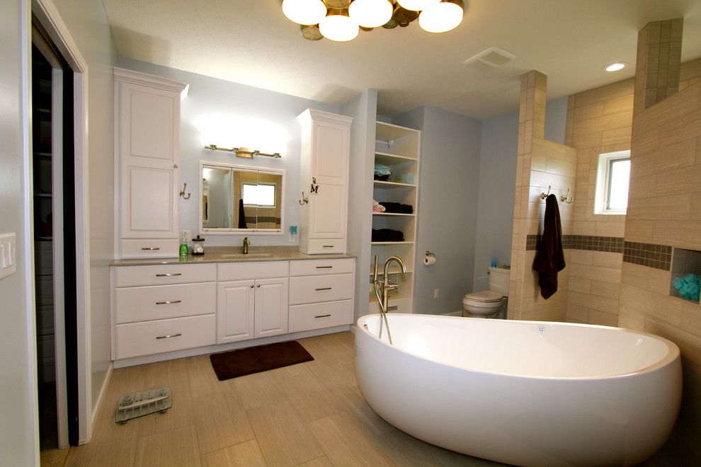 Pearle Vision Omaha for a Modern Bathroom with a White and Great Modern Space by Merritt's Quality Cabinets