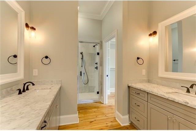 Penthouse New Orleans for a Transitional Bathroom with a Hardwood Flooring and Bathrooms by Ses Enterprises, Llc