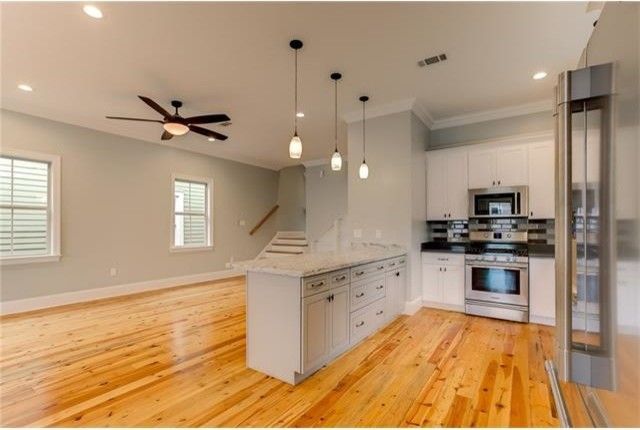 Penthouse New Orleans for a Transitional Kitchen with a New Orleans and Kitchens by Ses Enterprises, Llc