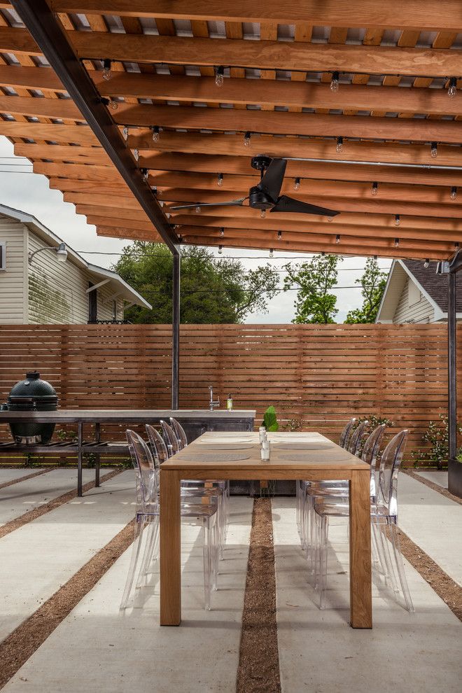 Picket Fence Realty for a Contemporary Patio with a Grill Counter and Back Yard Patio by Brett Zamore Design