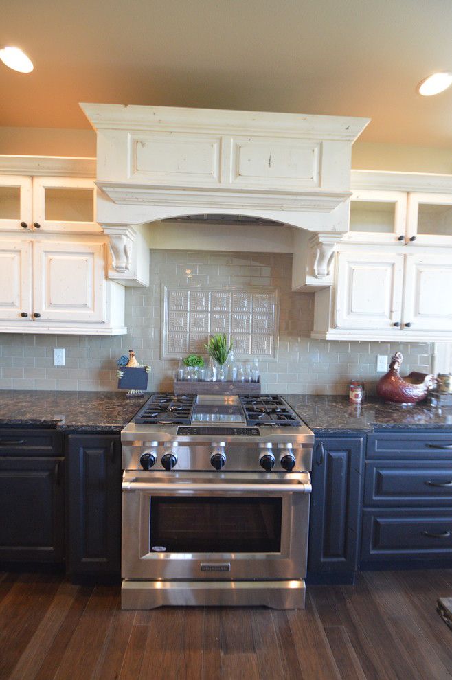 Pierce Flooring for a Rustic Kitchen with a Herringbone Tile and 2015 Parade Home by Pierce Flooring & Design