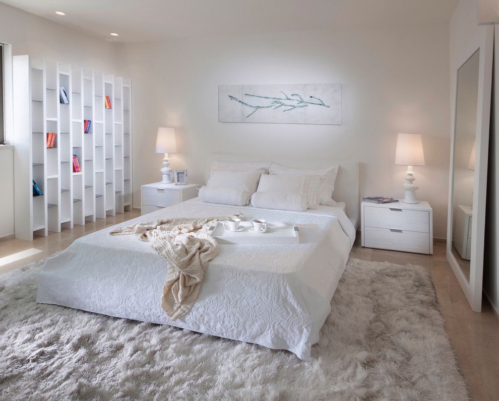 Pilings for a Contemporary Bedroom with a White Bedroom and Bedroom by Elad Gonen