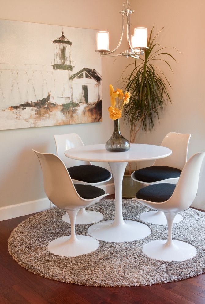 Pilings for a Transitional Dining Room with a Round Rug and Sunnybrook Renovation by Red Deer Carpet One