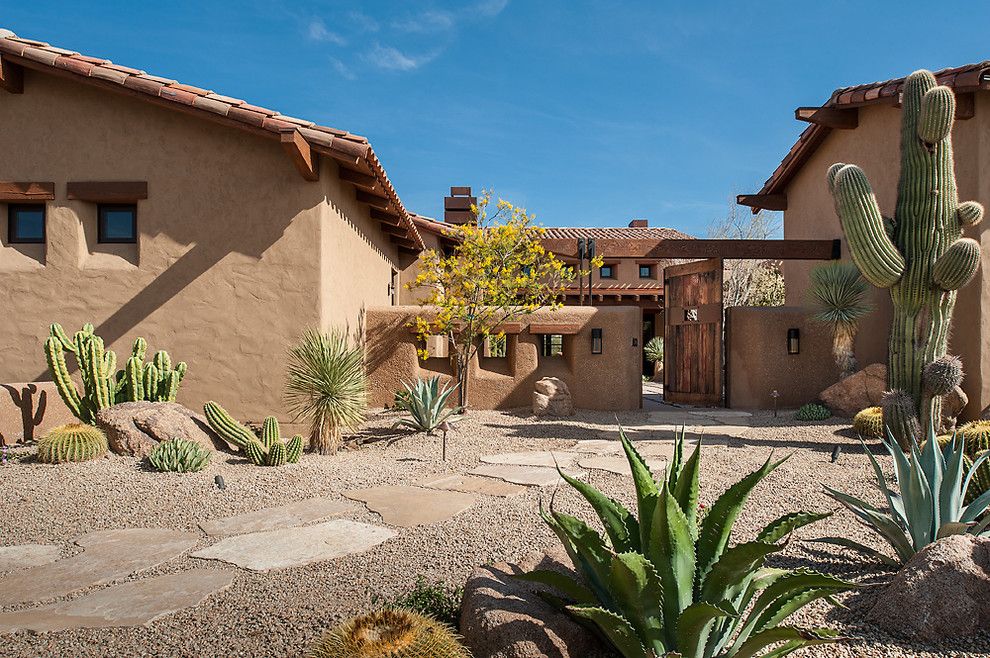 Pine Bluff Sand and Gravel for a Southwestern Exterior with a Beige Stucco Exterior and Whisper Rock Residence by Tate Studio Architects