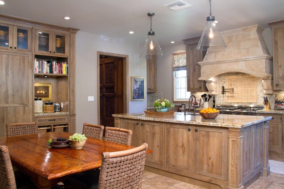 Pismo Dunes for a Rustic Kitchen with a Range Hood and Charmean Neithart Interiors, Llc. by Charmean Neithart Interiors