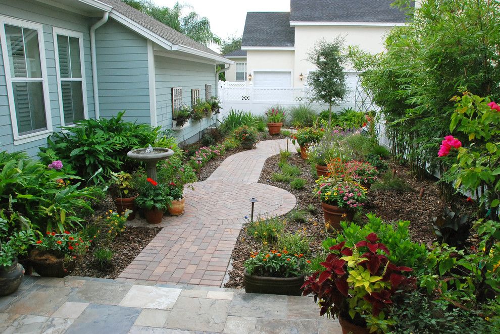 Pleasure Island Orlando for a Traditional Landscape with a Brick and Intimate Cottage Garden by Hortus Oasis