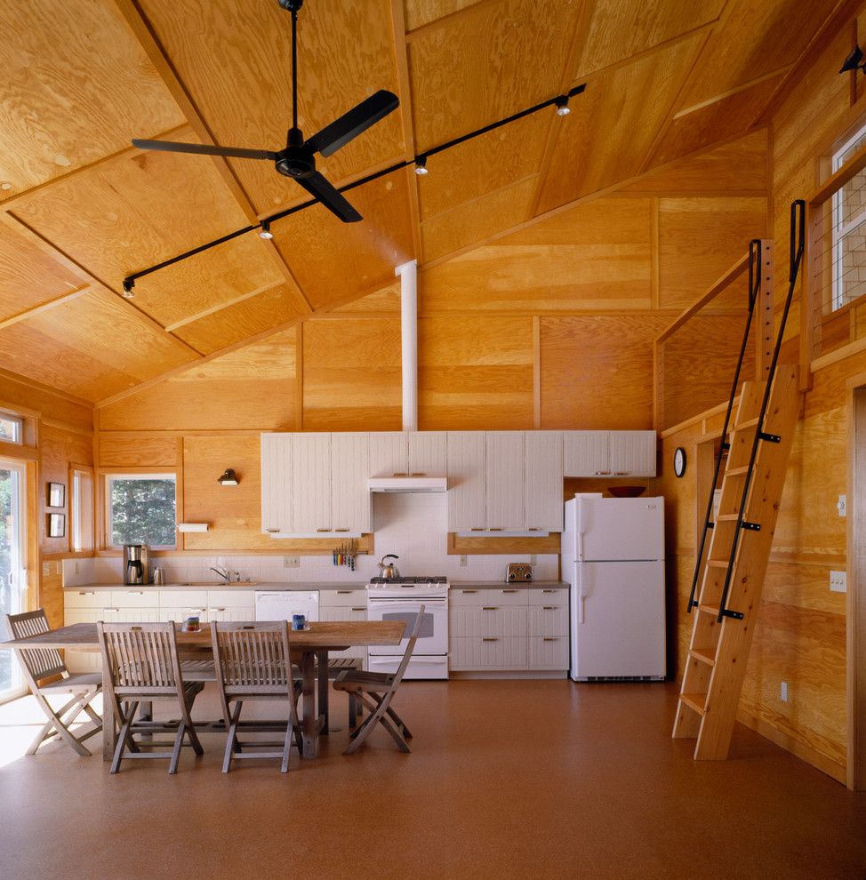 Plywood Plank Floor for a Contemporary Kitchen with a Cable Railing and Contemporary Kitchen by Lawrencearchitecture.com