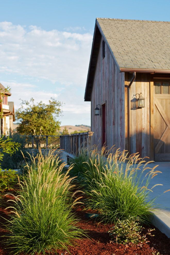 Pottery Barn Ornaments for a Rustic Landscape with a Railing and Rustic Wine Country Residence by Addison Landscape & Maintenance, Inc.