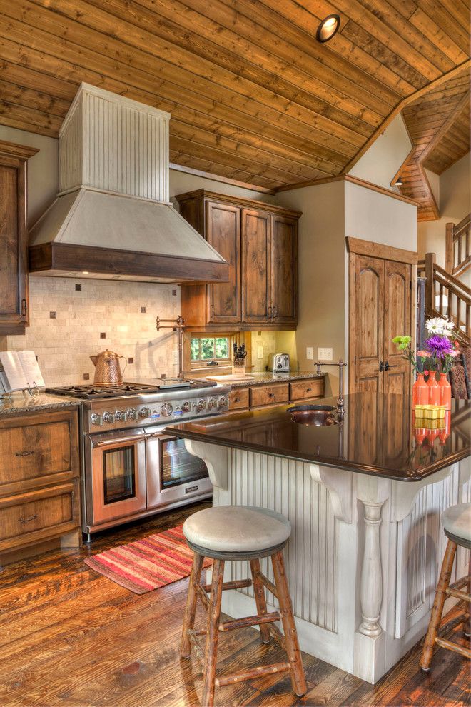 Pro Direct for a Rustic Kitchen with a Cabin and Lower Whitefish Lake 7 by Lands End Development   Designers & Builders