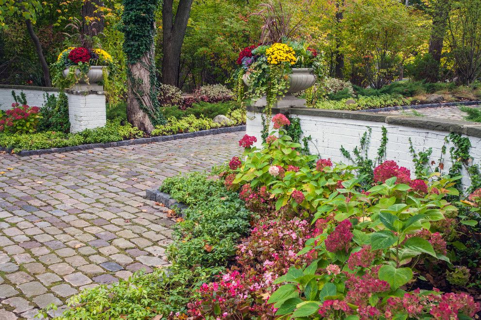 Proflower for a Traditional Landscape with a Stone Pavers and Ravine Garden Oasis by Nlh Landscape Architects