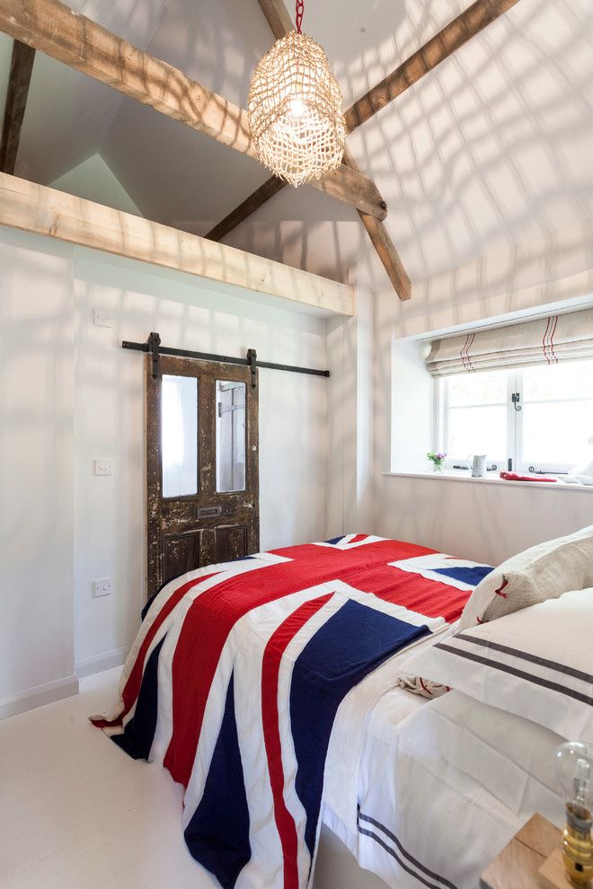 Proper Way to Hang American Flag for a Shabby Chic Style Bedroom with a Photography and the Island by Chris Snook