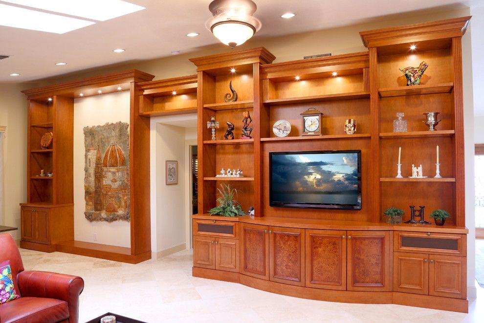 Pura Vida Miami for a Traditional Family Room with a Wall Unit and Traditional Entertainment Centers by Custom Artisan Cabinetry