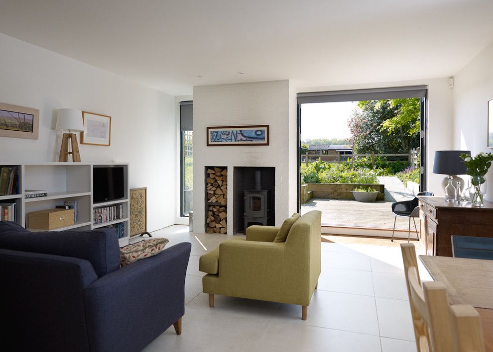 Quadra Fire Wood Insert for a Contemporary Living Room with a Porcelain Tiles and Old Telephone Exchange by Stephen Turvil Architects