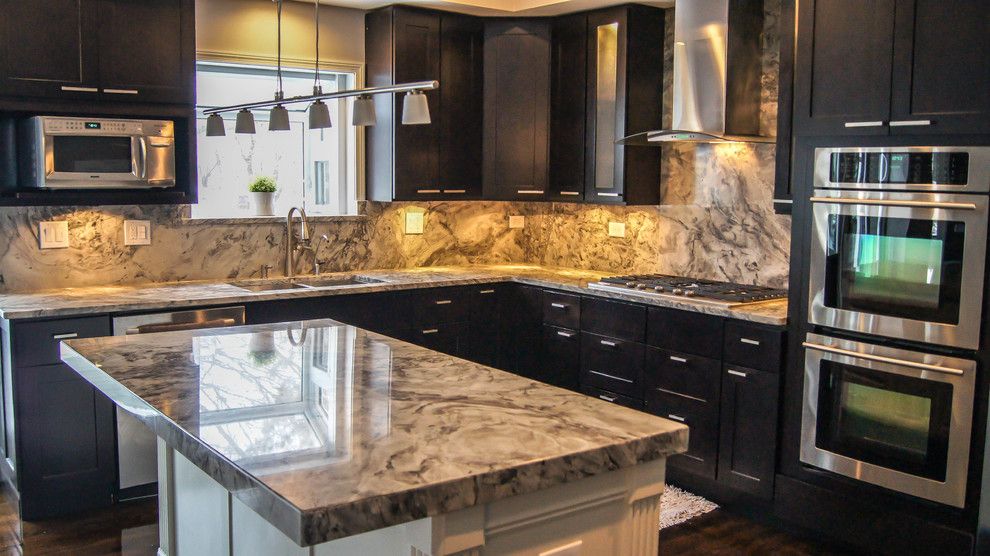 Quartz Countertops vs Granite for a Contemporary Kitchen with a Quartzite Countertops and Kitchen Redesign by Precision Stone Design