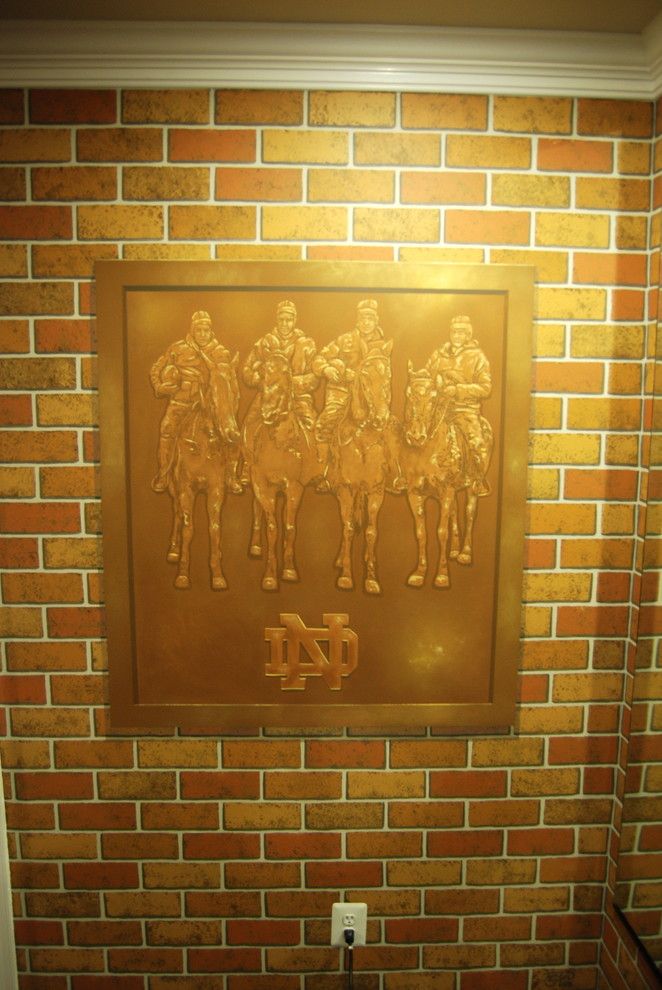 Quincy University Football for a Traditional Spaces with a Murals and Notre Dame Football Locker Room Mural by Tom Taylor of Wow Effects, in Virginia by Mural Art Llc Wall Murals and Fine Art