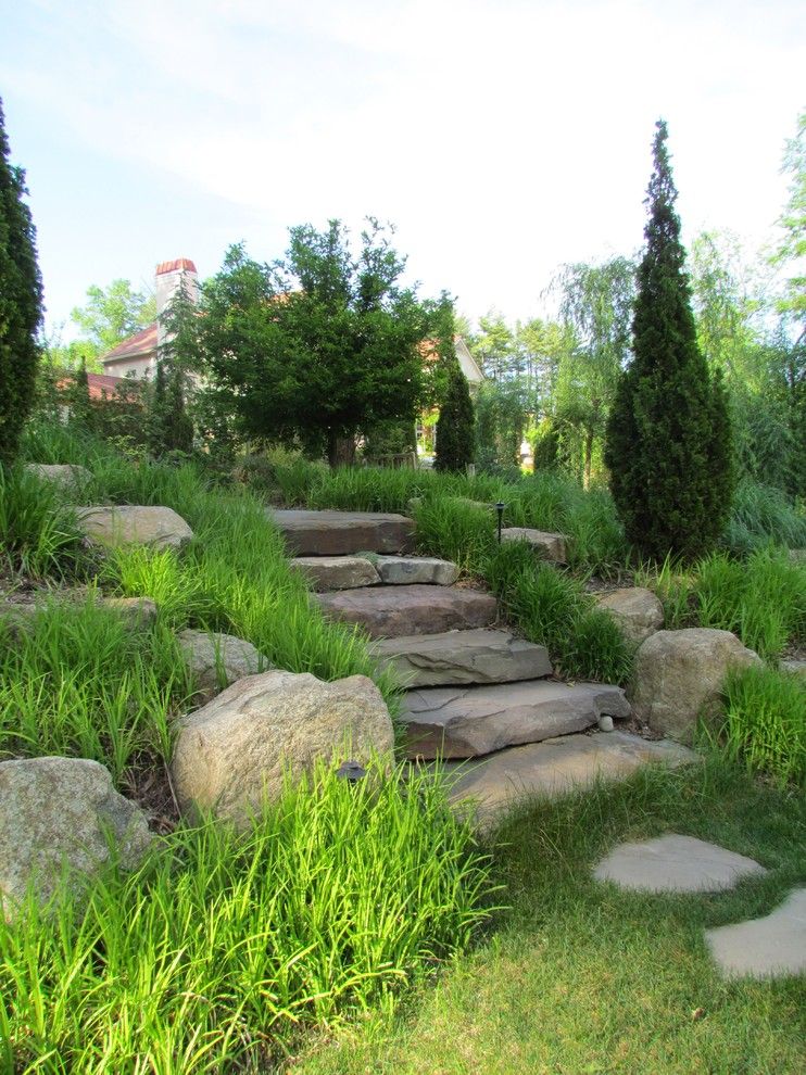 Railroad Tie Retaining Wall for a Mediterranean Landscape with a Stepping Stones and Elegant Estate by Rutgers Landscape Design