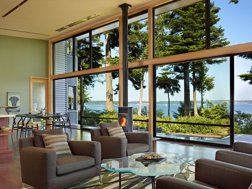 Raymond Building Supply for a Modern Living Room with a Natural Wood Trim and Port Ludlow House by Finne Architects